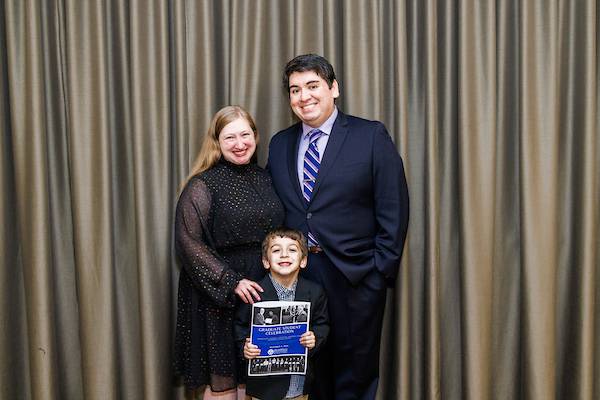 Joseph Tekelly (right) and family
